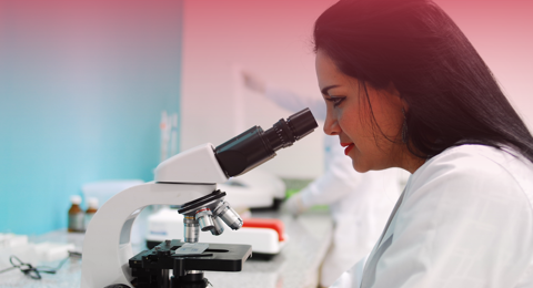 Woman Using A Microcospe