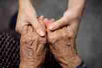Elderly Care Holding Hands