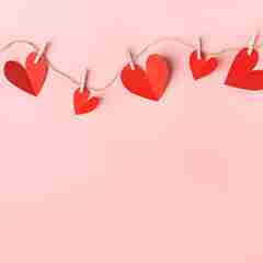 Red Hearts On Pink Background
