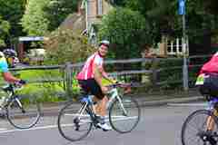 One of our fundraisers riding a bike. 
